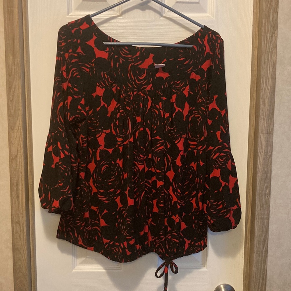 Black and red blouse with roses.